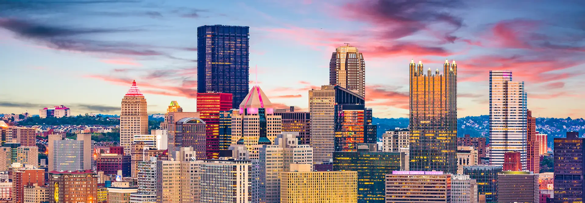 Pittsburgh Pennsylvania skyline with downtown buildings at sunset